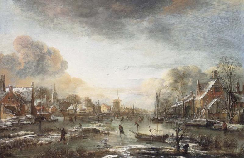 Aert van der Neer A Frozen River by a Town at Evening